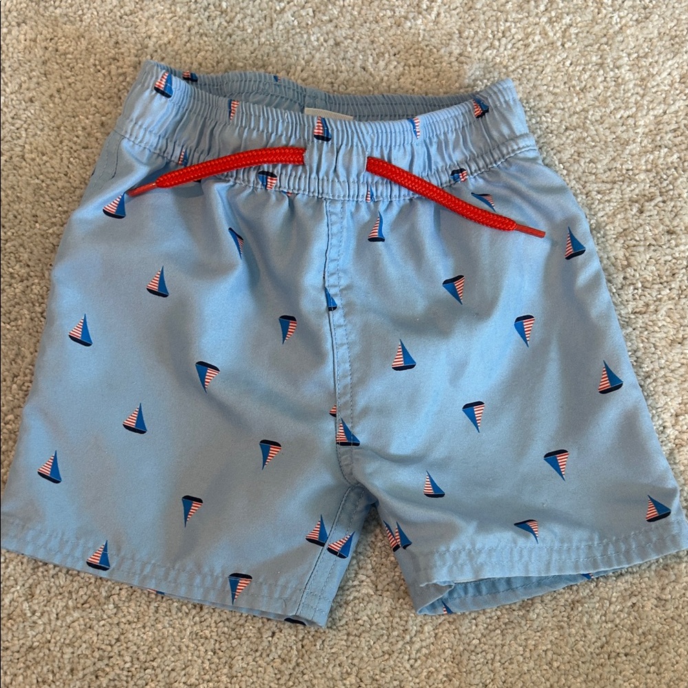 Starting Out Blue Kids Swim Trunks with Red Accents